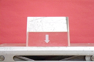 Arrow viewed through prism